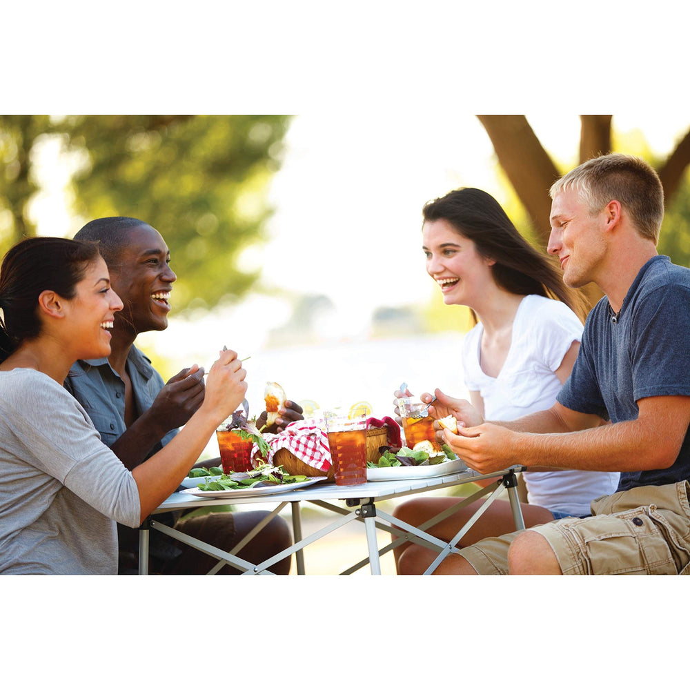 Coleman outdoor table at campsite enables portable dining and setup