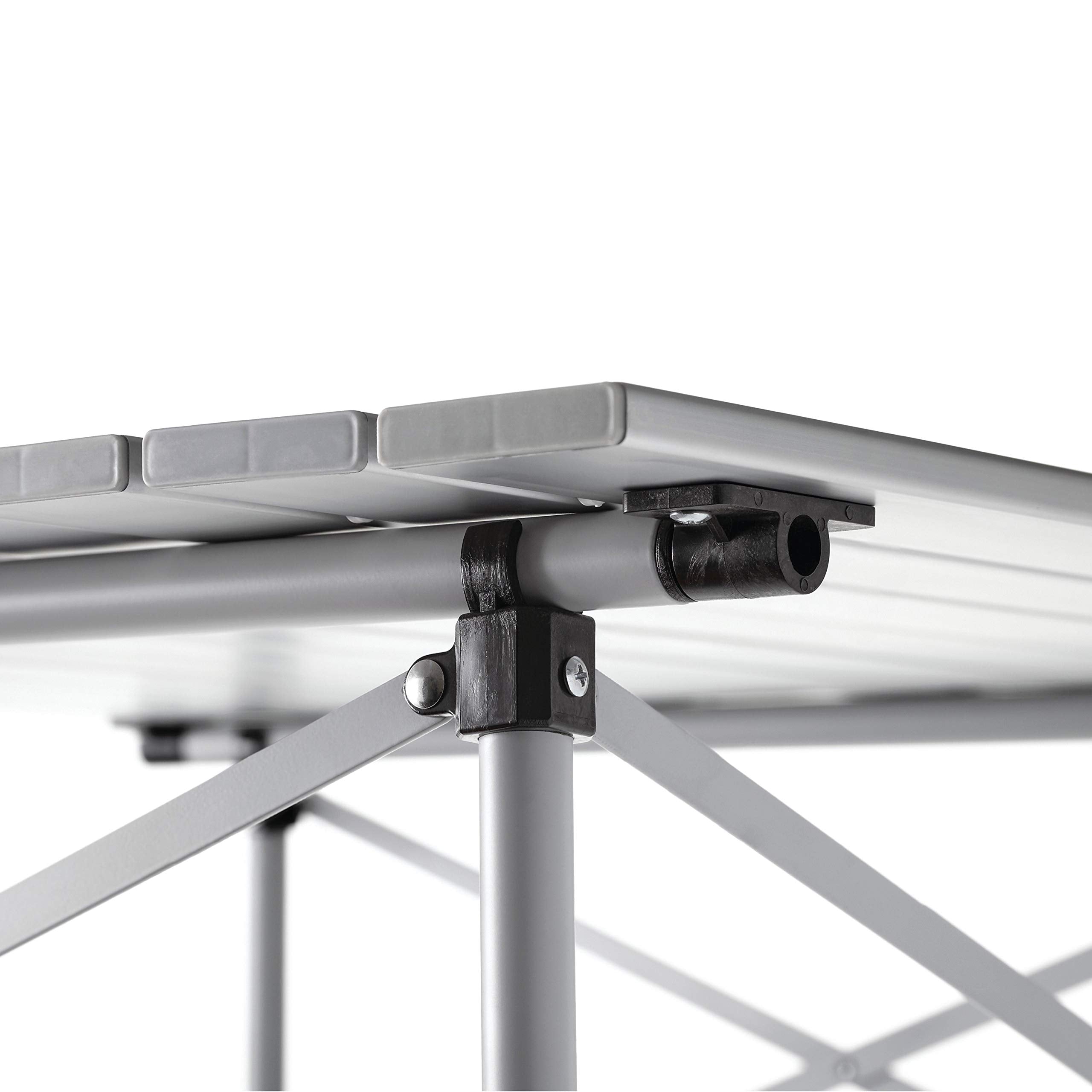 Coleman folding table seating four for group meals and games