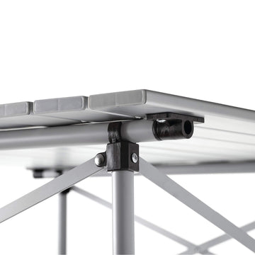 Coleman folding table seating four for group meals and games