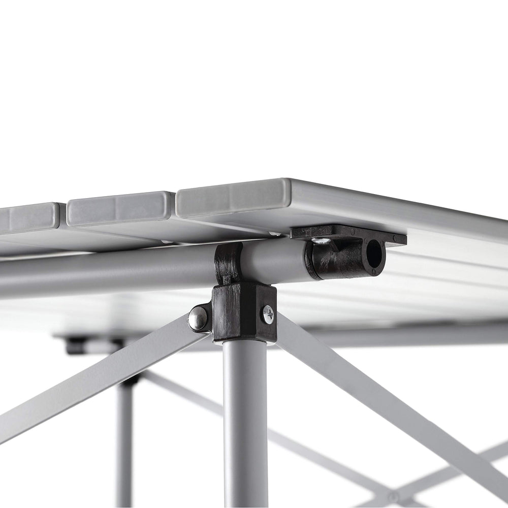 Coleman folding table seating four for group meals and games