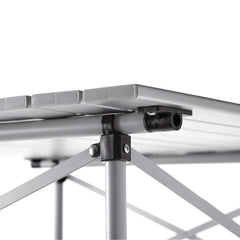 Coleman folding table seating four for group meals and games