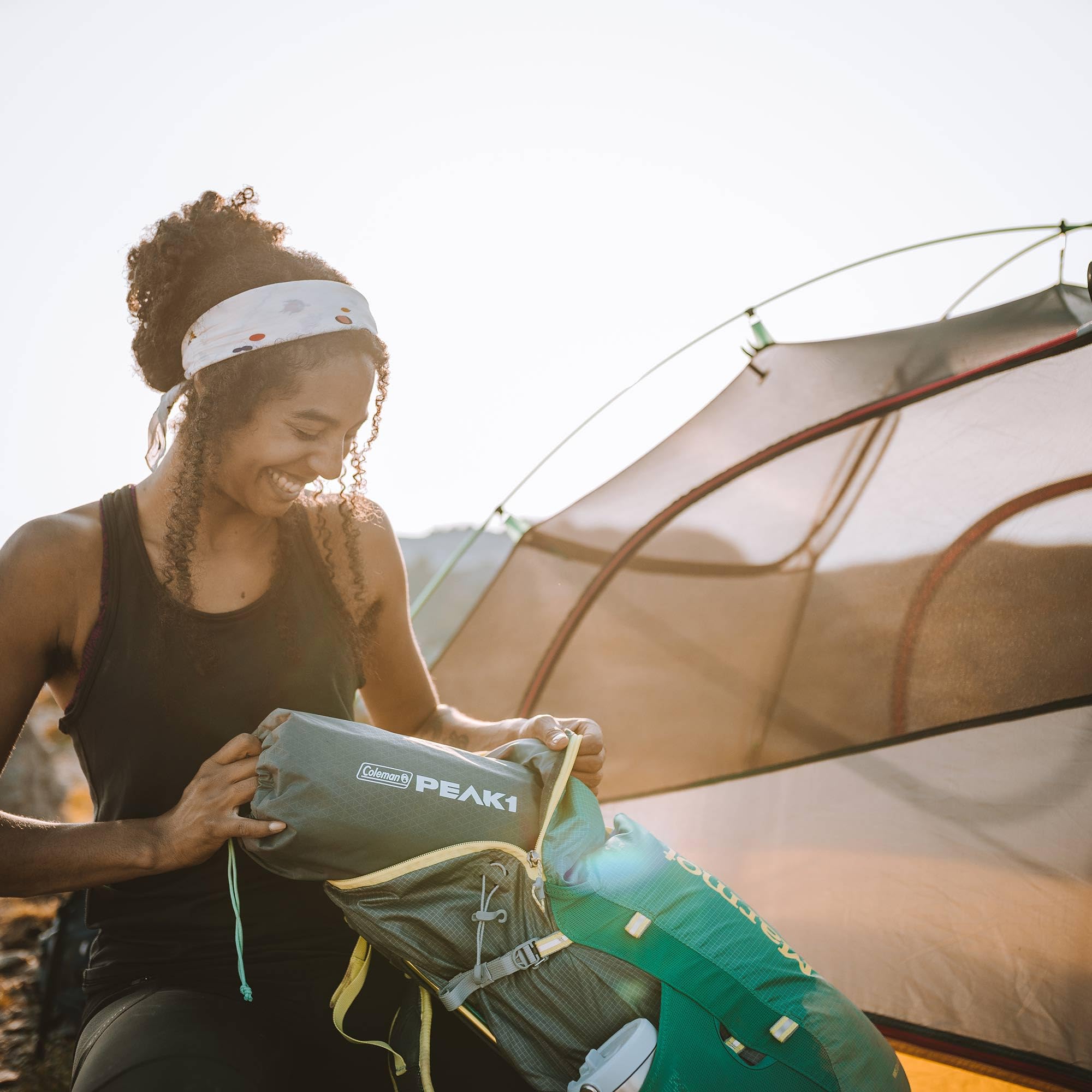 Coleman PEAK1 sleeping pad suited for car camping setups.