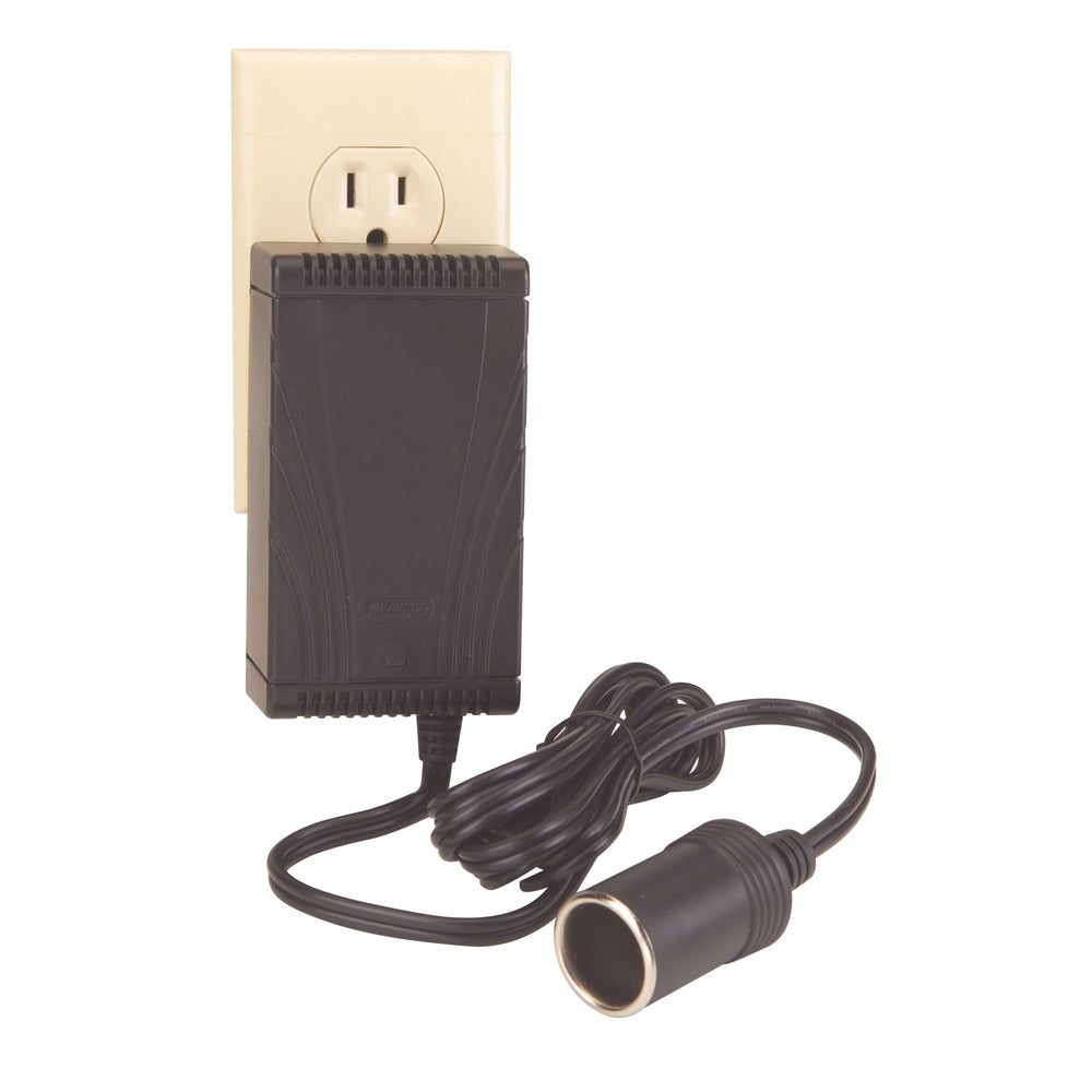 Coleman Power Supply Adaptor plugged into a wall outlet powers a 12V cooler.