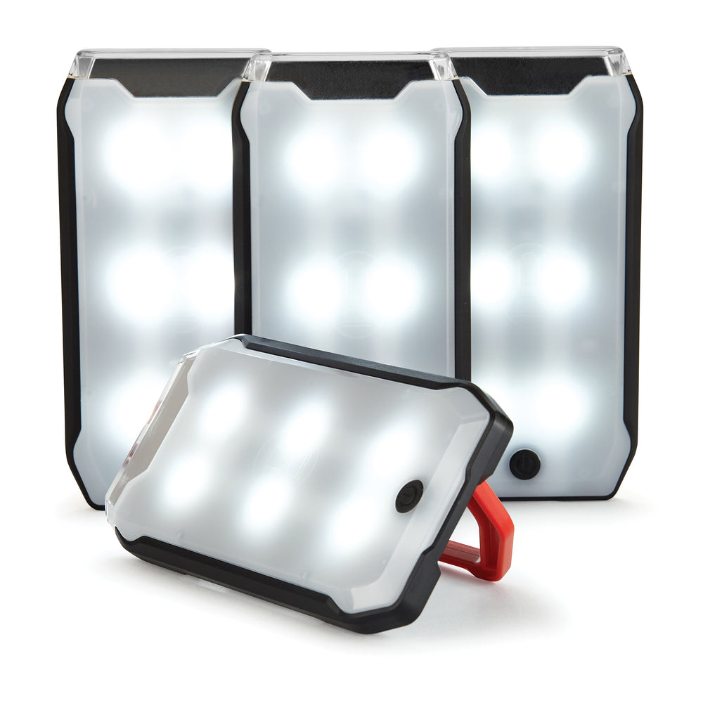 Magnetic panel on metal surface provides hands-free lighting with Coleman lantern
