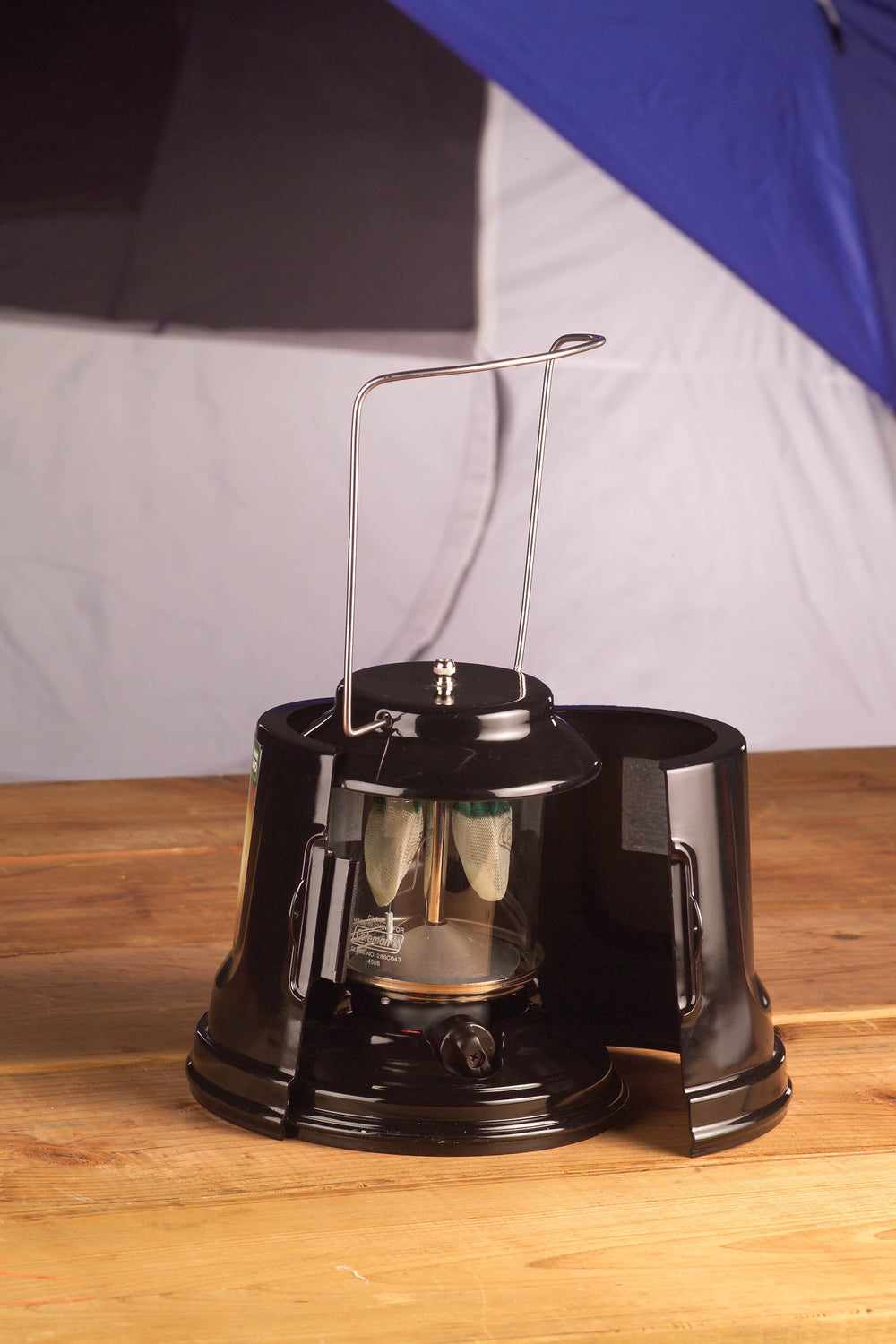 Coleman QuickPack Lantern stored in a compact carry case for easy travel.