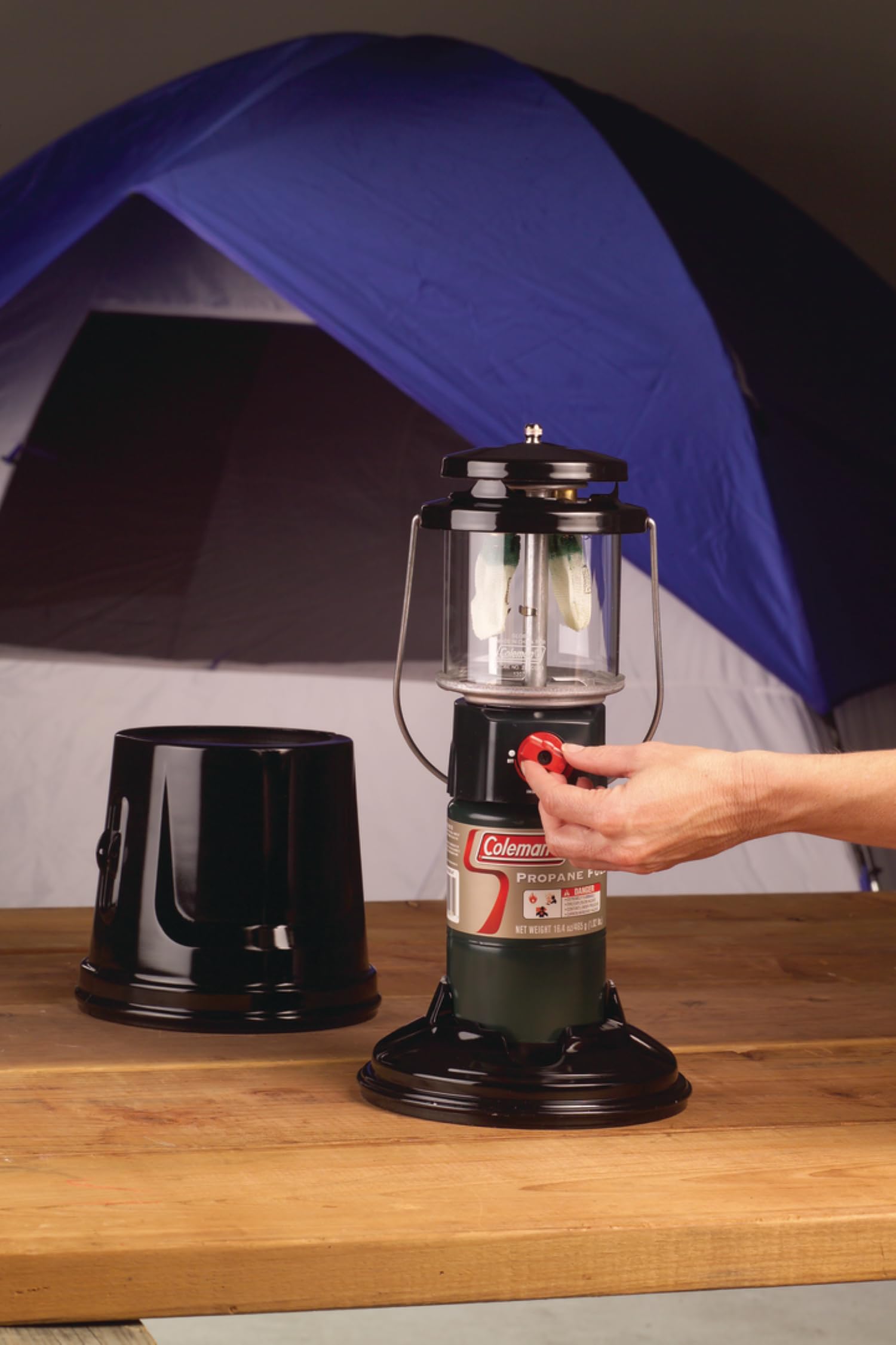 Coleman QuickPack Deluxe+ porcelain-coated ventilator resists rust outdoors.