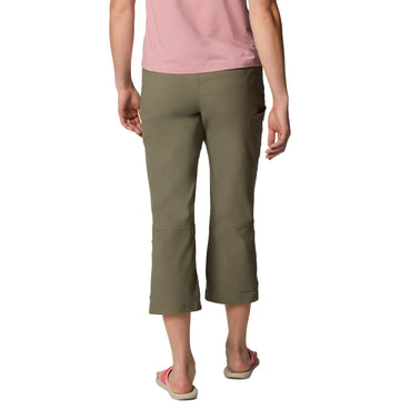 Columbia Leslie Falls Capri II side view in stone green, highlighting pockets and movement.