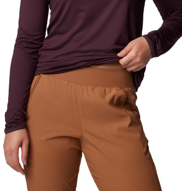 Columbia Leslie Falls Pant on model demonstrates active fit for movement