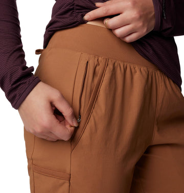 Columbia Leslie Falls Pant outdoor trail scene showcasing sun-protective fabric