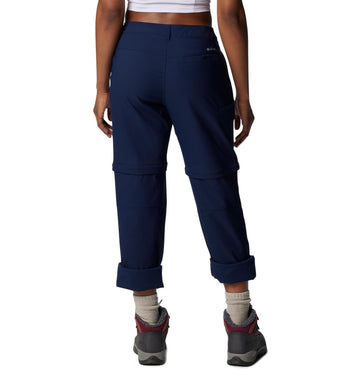Columbia Leslie Falls pants side view highlights lightweight stretch for trail comfort.