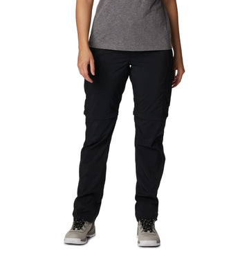 Columbia Silver Ridge Utility Convertible Pant on model hiking for versatile trail comfort