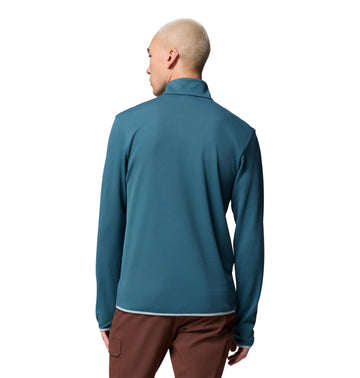 Columbia Tech Trail Utility Warm Half Zip Everblue side view shows thumbholes for secure fit