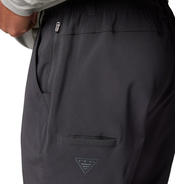 Columbia Uncharted pant shark xx-large model wearing near water for versatile use.