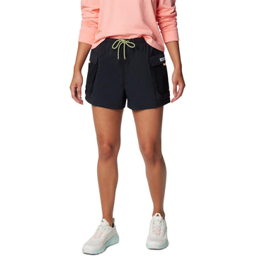 Columbia Women's PFG Open Water Short black on the beach showing sun protection and quick-dry comfort