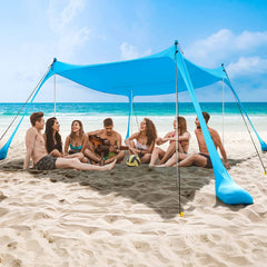 COMMOUDS beach tent 7x7ft setup provides ample shade for families.