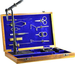 Complete fly-tying materials kit including hooks, feathers, threads, and lead wire with a DVD