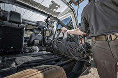 Condor Elite COLOSSUS duffle bag side view shows expandable locker for bulky gear and quick access.