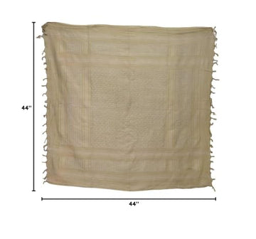 Condor Elite Shemagh tan worn as a versatile scarf in outdoor settings.