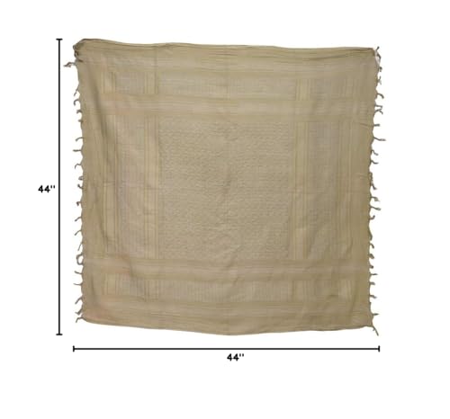 Condor Elite Shemagh tan worn as a versatile scarf in outdoor settings.