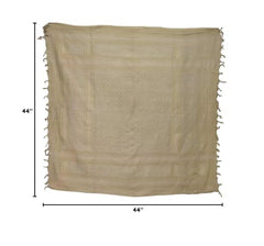 Condor Elite Shemagh tan worn as a versatile scarf in outdoor settings.