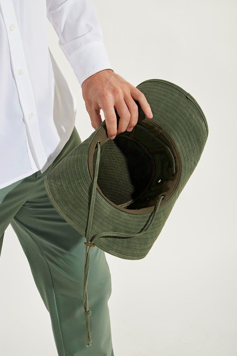 Coolibar men's cotton hat Charlie Forest Green side profile emphasizes vented panels for breathability.