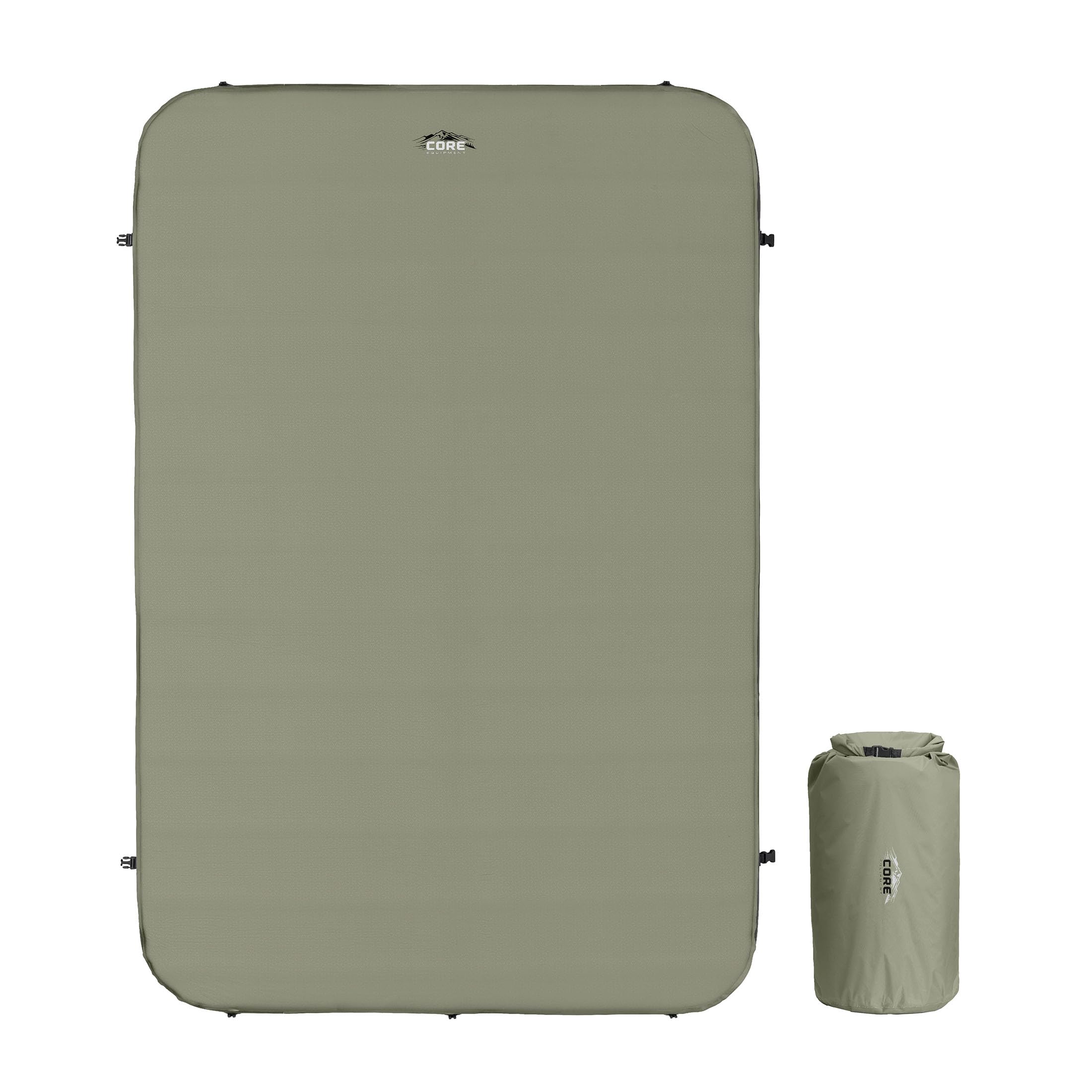 CORE Double Self Inflating Camping Bed unrolled and ready for comfort on a campsite.