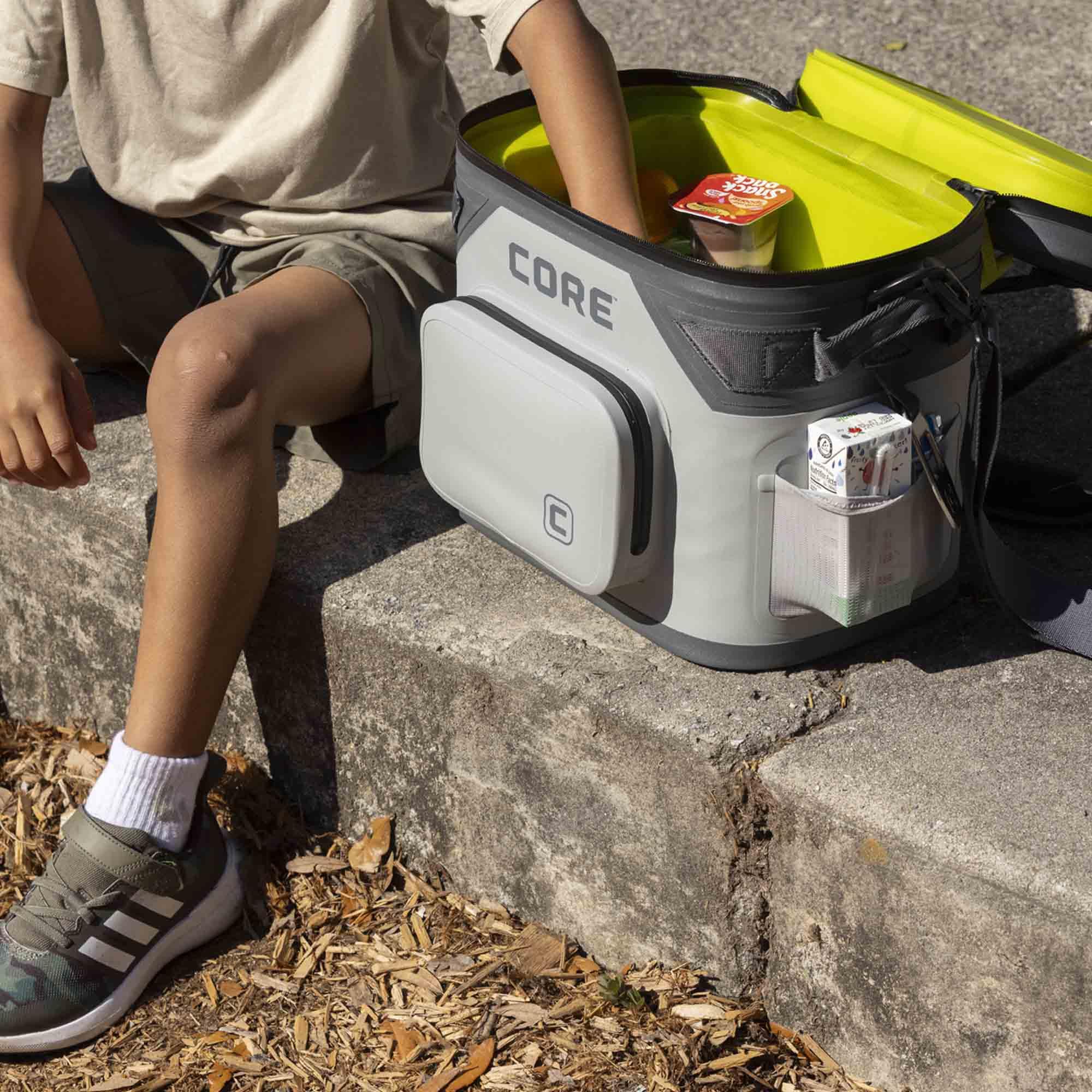 CORE versatile carry design with adjustable strap suits tailgates and beach trips.