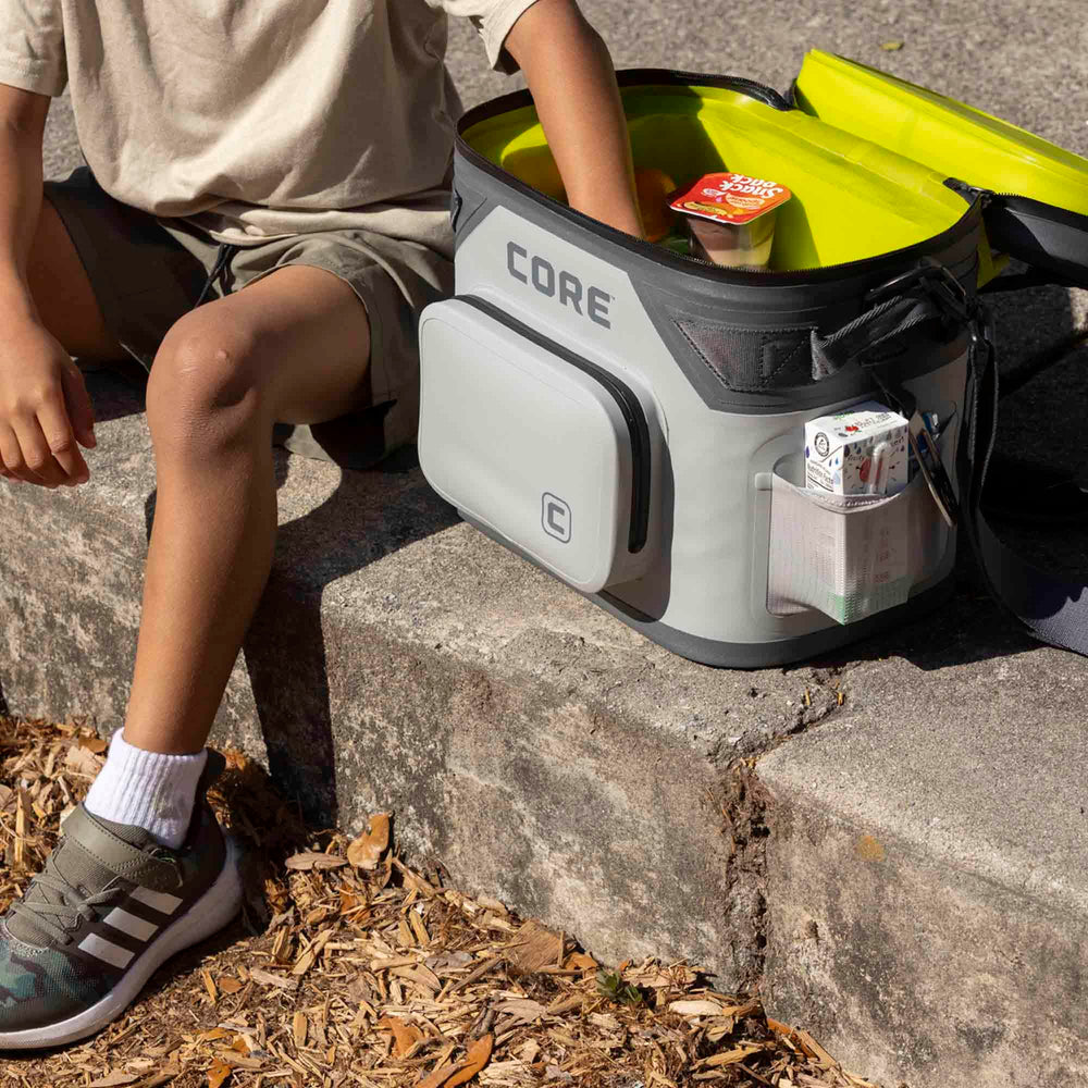 CORE versatile carry design with adjustable strap suits tailgates and beach trips.