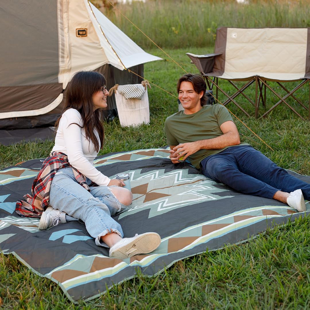 CORE Outdoor Weighted Blanket beach-scene highlights sand-proof surface and built-in portability for quick shade.