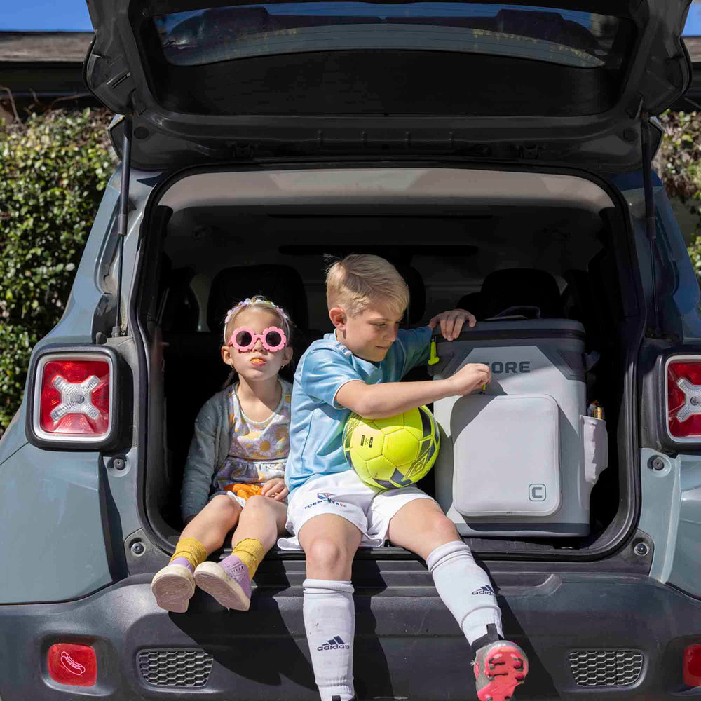 CORE wine-bottle transport feature shows easy, safe carrying at campsites and tailgates.