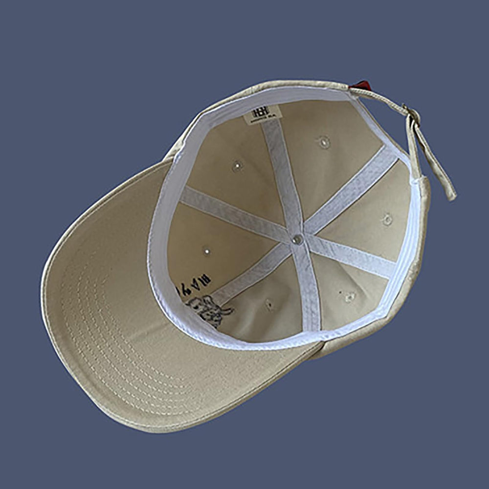 CORIRESHA embroidery detail showcases retro Japanese artwork on the beige cap.