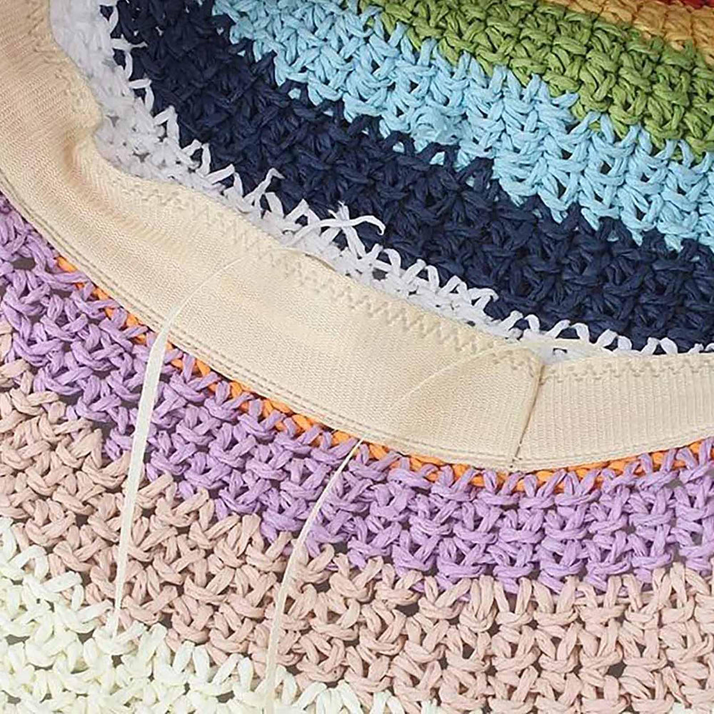 Coriresha wide brim beach hat protects your face with chic style.