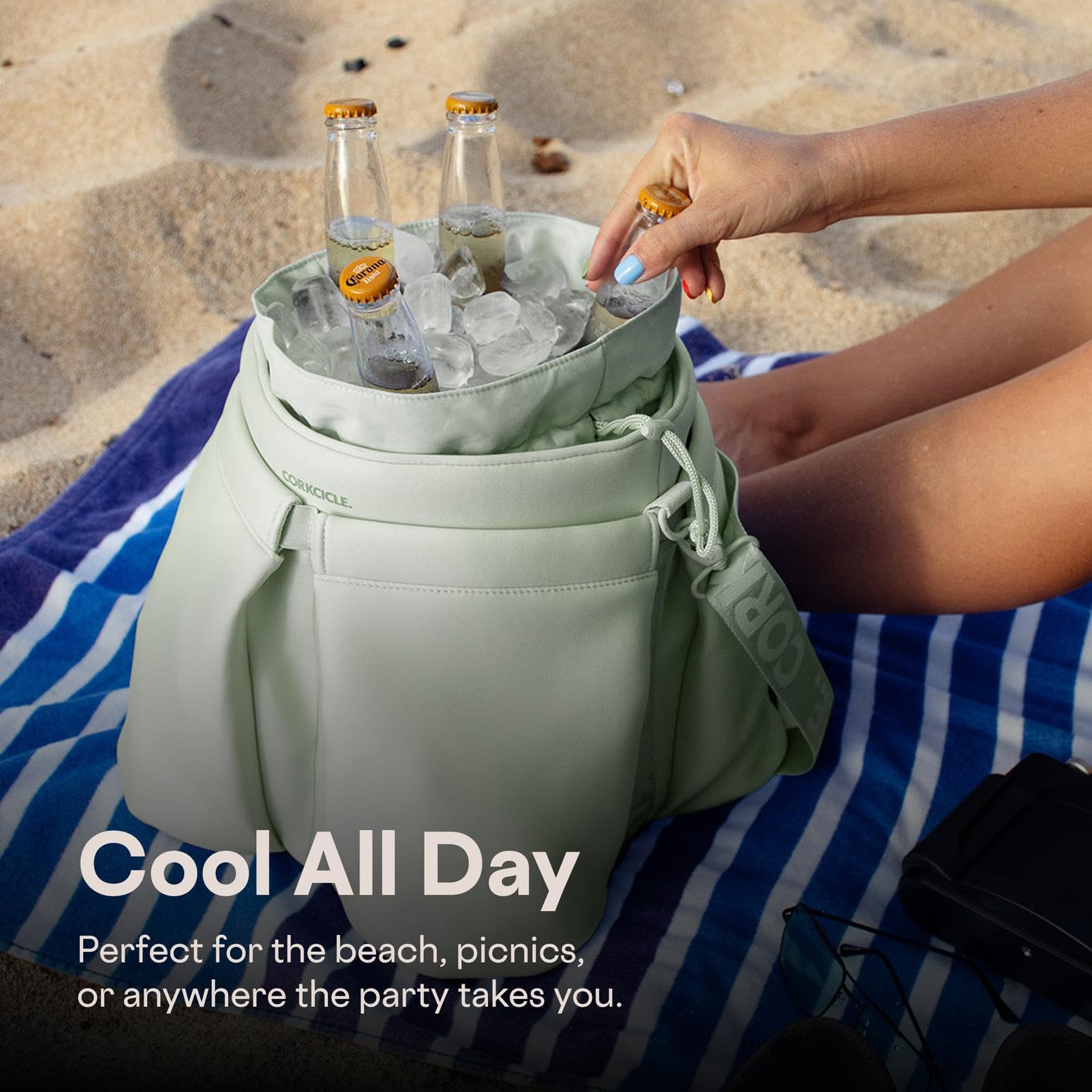 Corkcicle Beverage Bucket Cooler Bag Periwinkle beverage setup supports wine, cans, snacks.