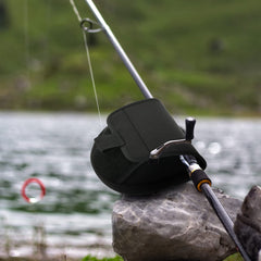 Reel cover with hook and loop closure for easy access
