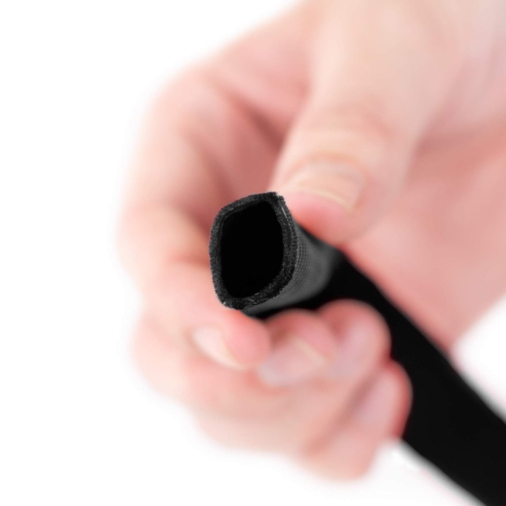 Country Brook Design close up of tubular webbing texture showing pliable smooth feel.