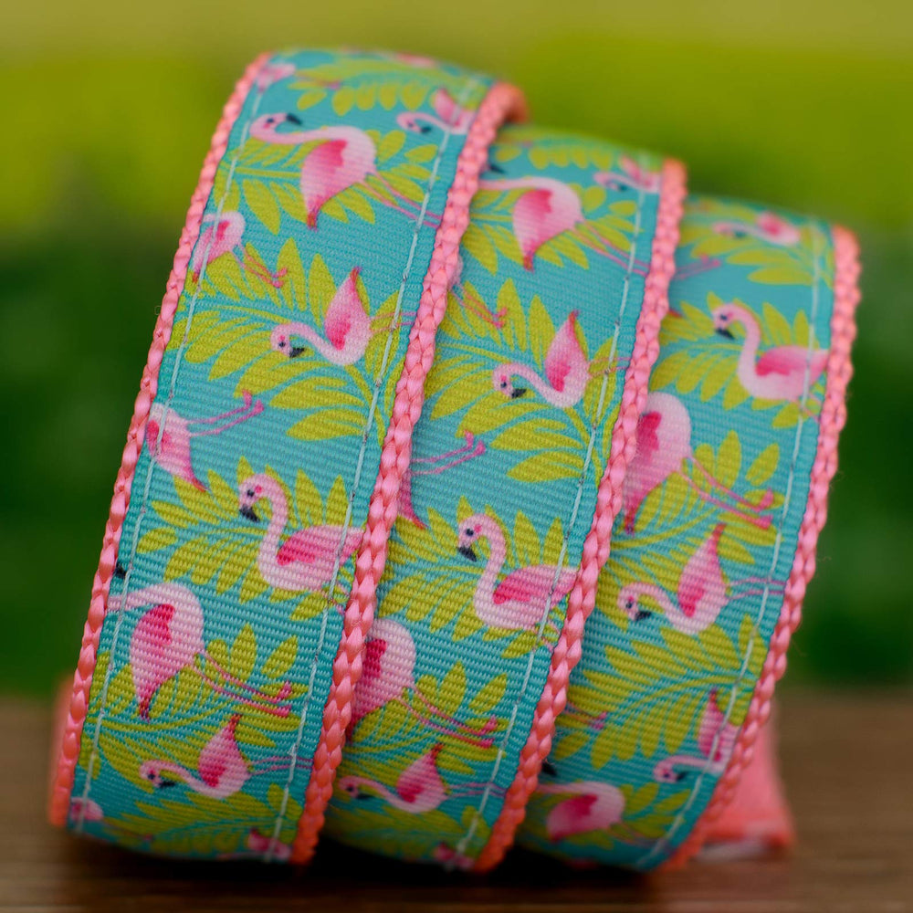 Country Brook Design flamingos ribbon on pink nylon webbing spool for easy storage.