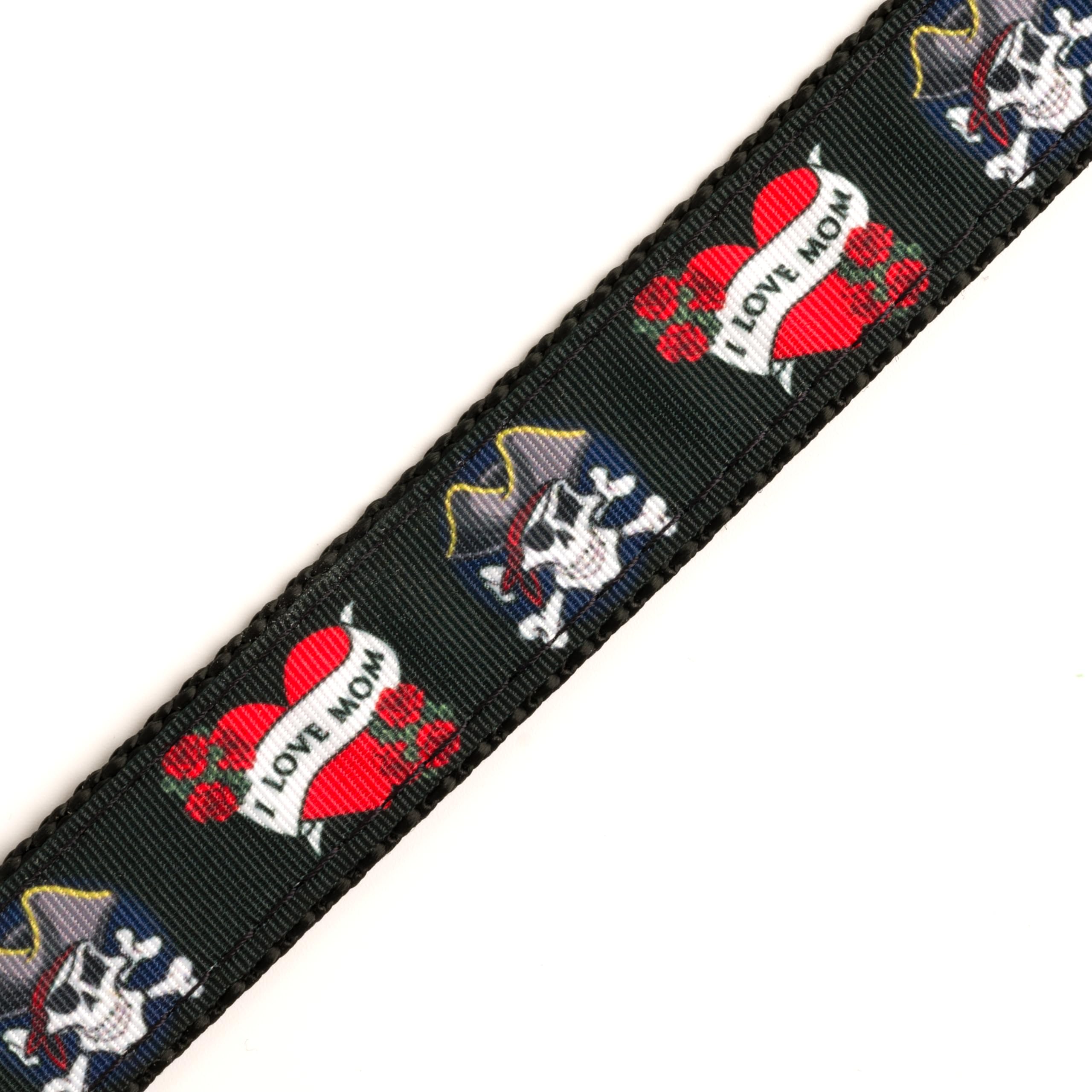 Country Brook Design red hearts and scarlet roses print on black webbing for bold accents.
