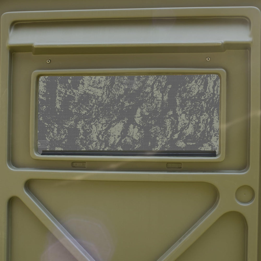 Covertech HD Window Camo being applied to glass for easy alignment.