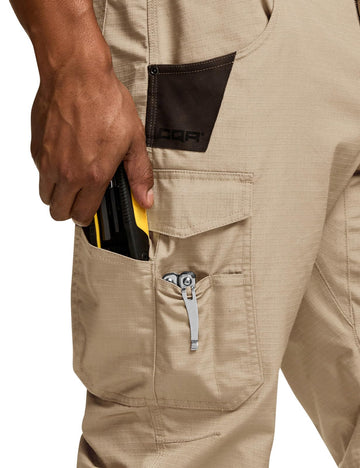 CQR men's quick dry work pants in motion, demonstrating flexible movement.