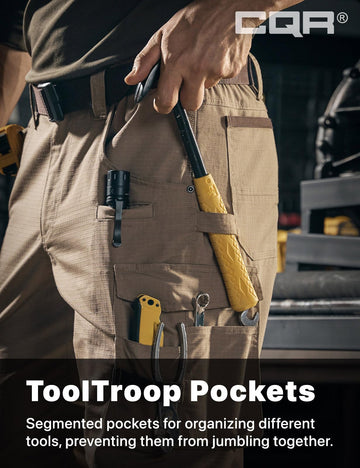 CQR men's quick dry work pants stretch waistband in action.