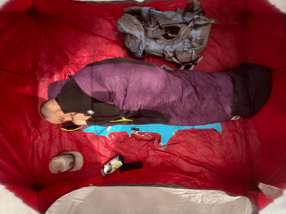 Crazy Creek AirLounger leg-flap chair mode adapts to uneven ground.