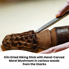 CreationCarvings adjustable-height walking stick for versatile outdoor support.