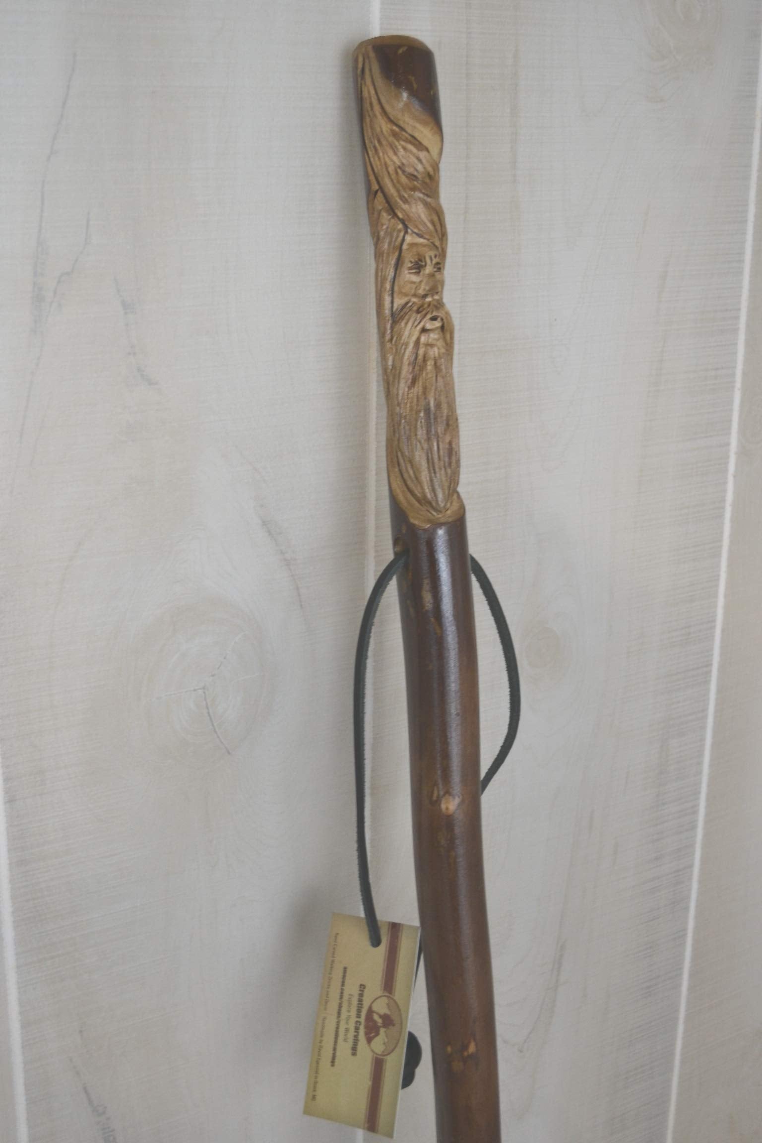 CreationCarvings dark wood finish adds a timeless outdoor look.