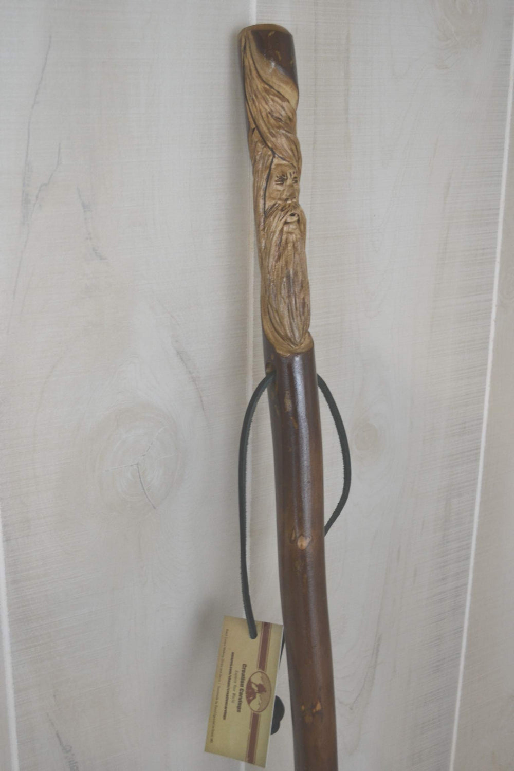 CreationCarvings dark wood finish adds a timeless outdoor look.