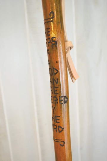 CreationCarvings hardwood walking stick showing adjustable height for a personalized fit.