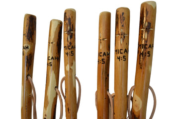 CreationCarvings Leather strap walking stick offers secure grip on long treks