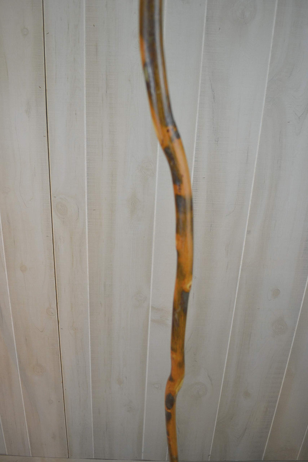 CreationCarvings walking stick with rubber tip for secure grip on uneven terrain