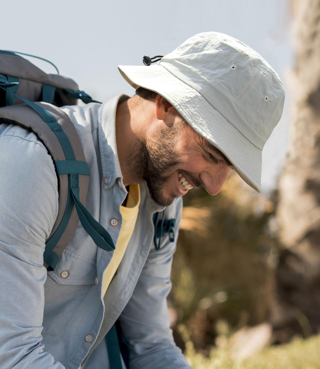 Packable sun hat folded for packing in a bag