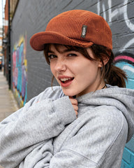 Croogo 5 Panel Hat brick red side view, complements streetwear with adjustable fit