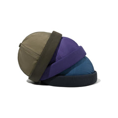 Adjustable elastic snapback buckle on blue visor-less cap